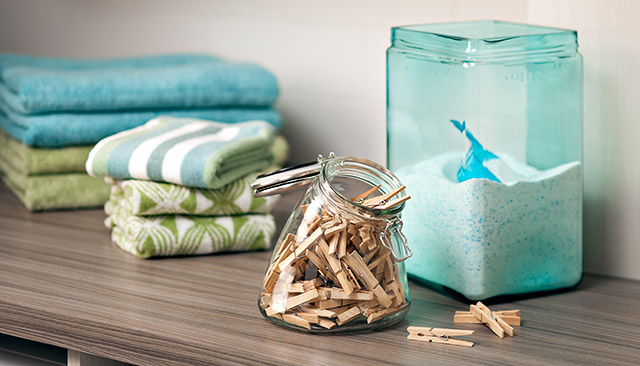 Colourful laundry detergent container.