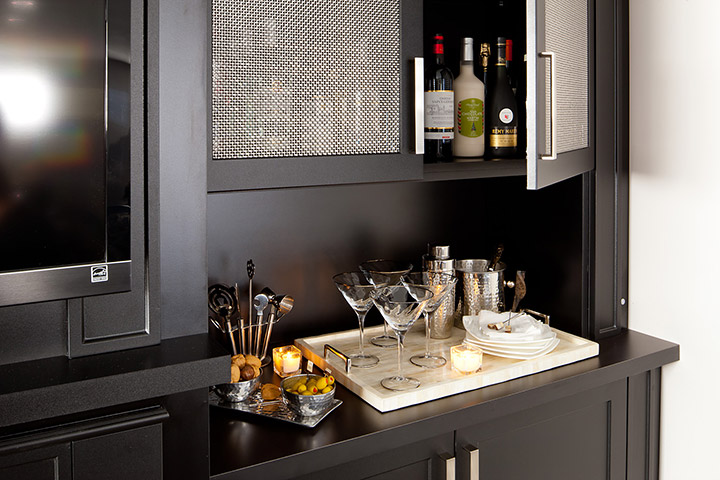 Liquor cabinet and serving area built in to an entertainment unit.