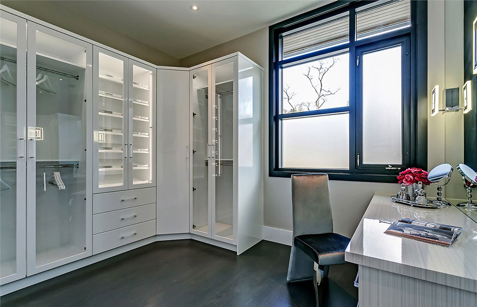 White contemporary master closet.