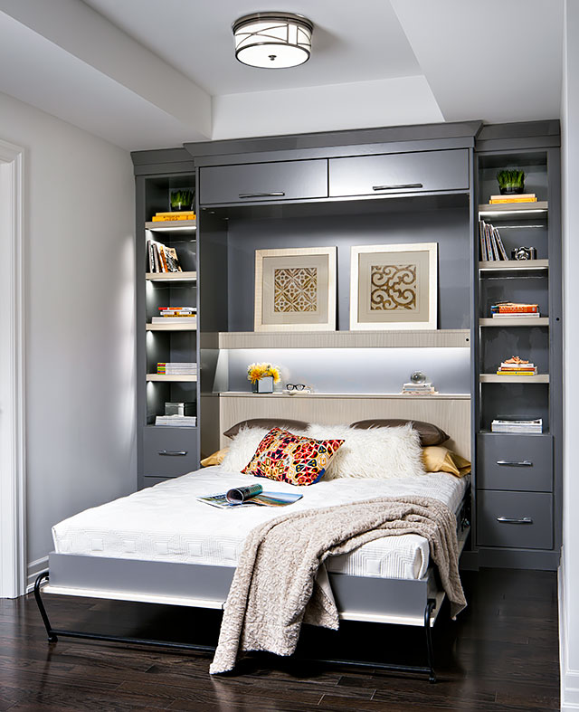 A modern wall bed creates an instant guest room in a condo.