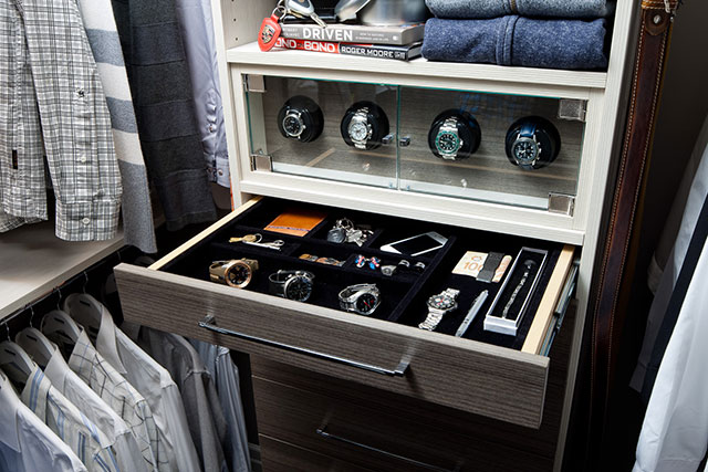 Organized closet with shelves and drawers to organize everything!