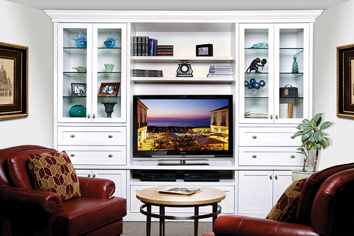 White entertainment unit with plenty of storage.