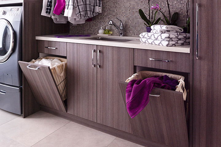 https://www.organizedinteriors.com/blog/wp-content/uploads/2016/12/laundry-room-ideas-hampers.jpg