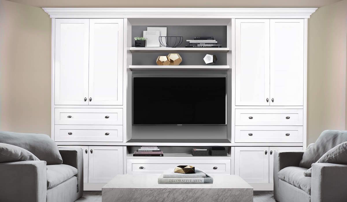 white home entertainment centre with 2 chairs