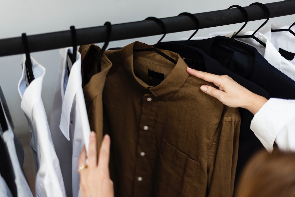 closet purge, person looking through closet