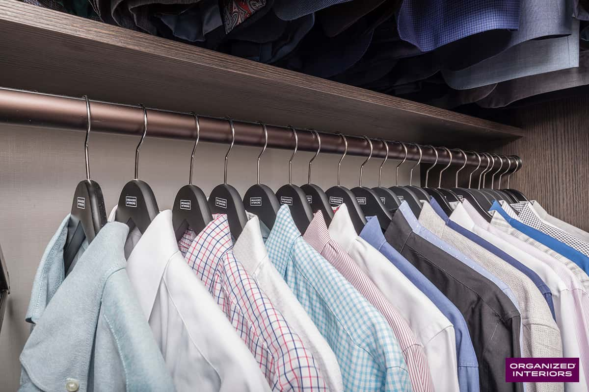 shirts on hangers in closet