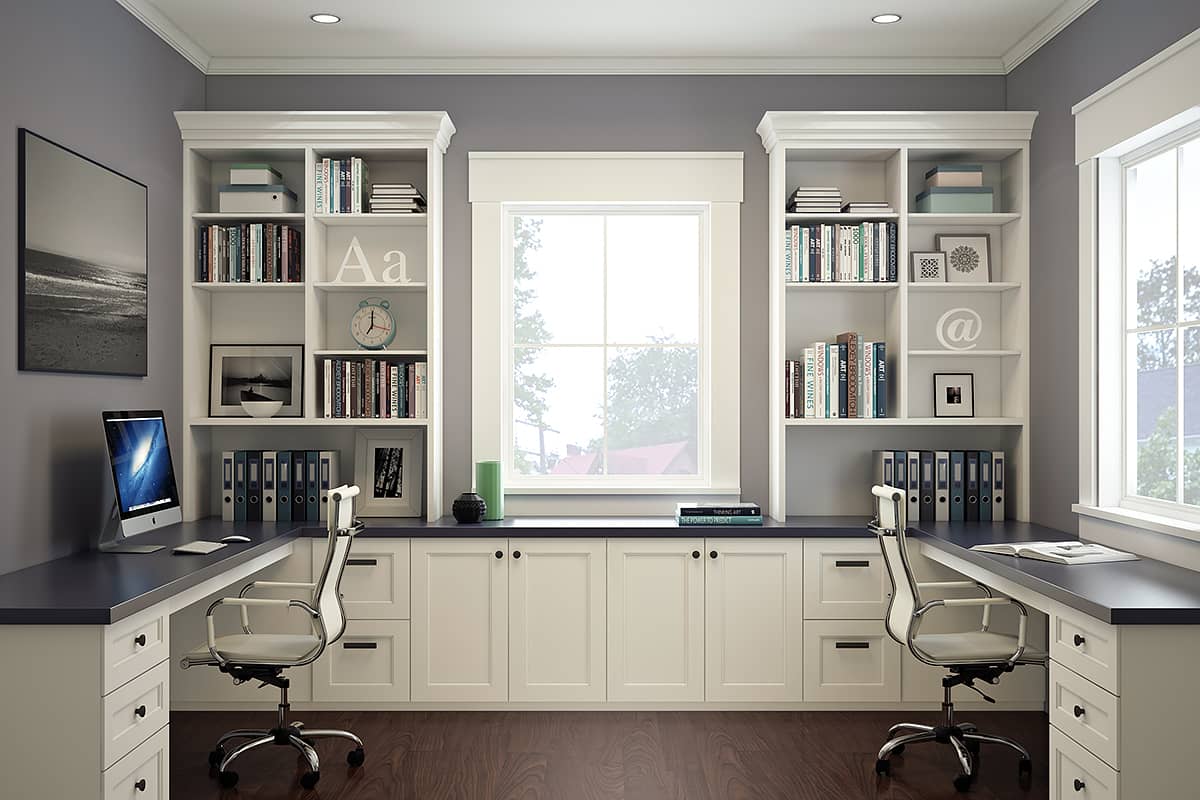 home office with two white desk, two white chairs, upper cabinetry