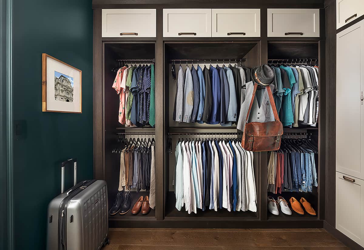green and white walk-in closet