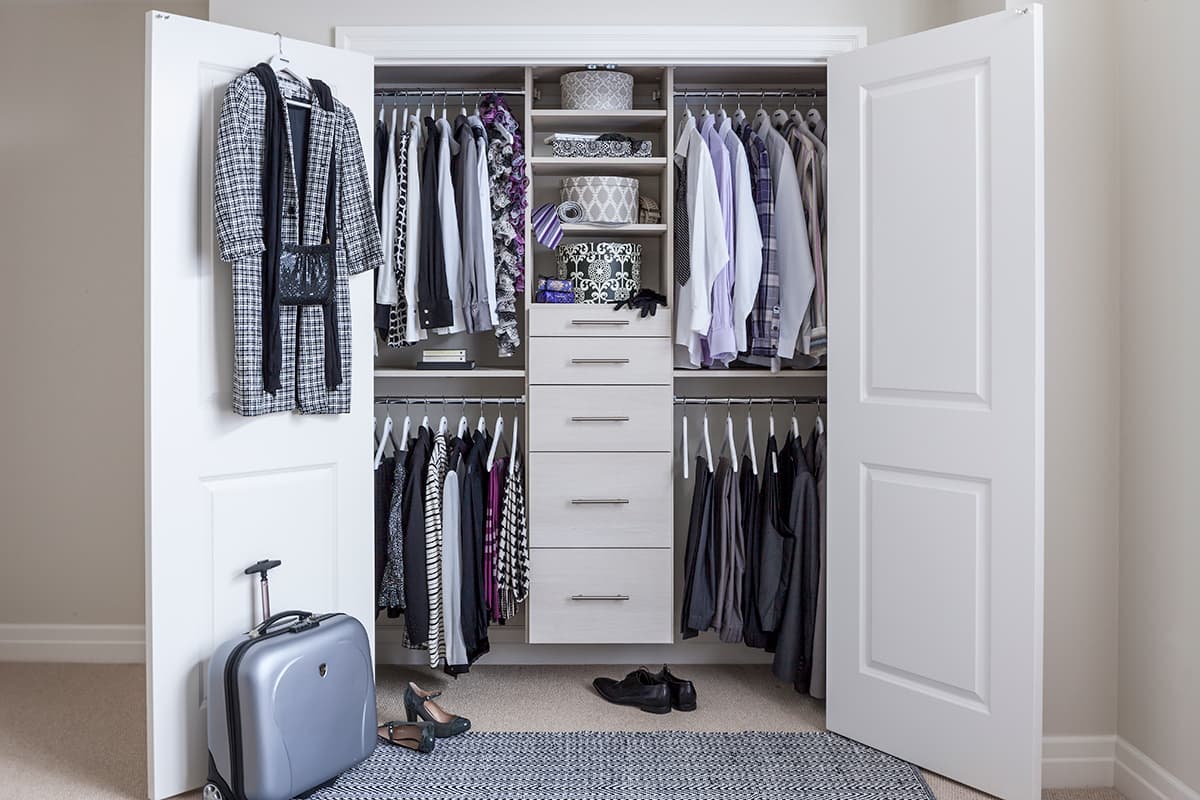 Reach-in Closet with Adjustable Shoe Organizer