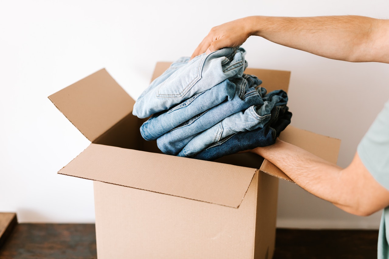 jeans being put in box