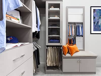 Custom walk-in closet in Toronto by Organized Interiors
