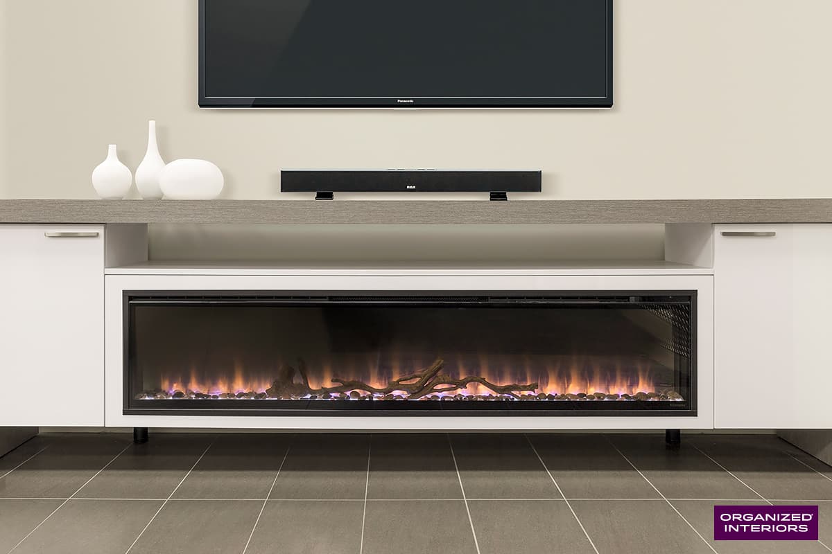 entertainment centre with tv and wall to wall built-in storage